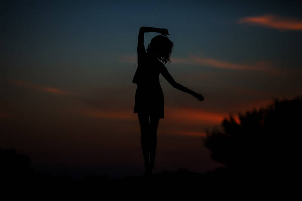 istock Silhouette of woman, concept of unknown, anonymous. 1201497887