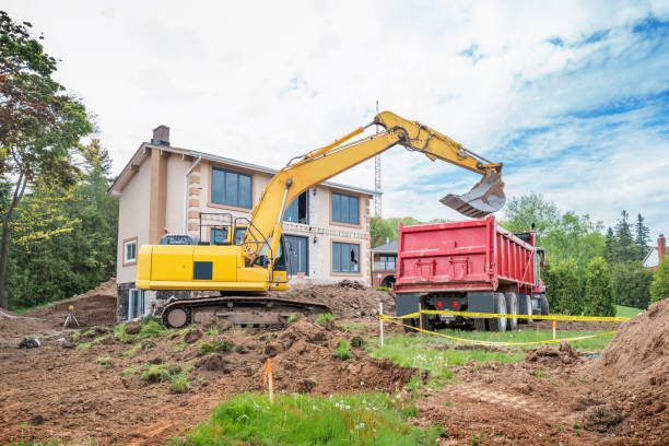 Closeup Excavator at demolition site, side view, background with copy space, full frame horizontal composition