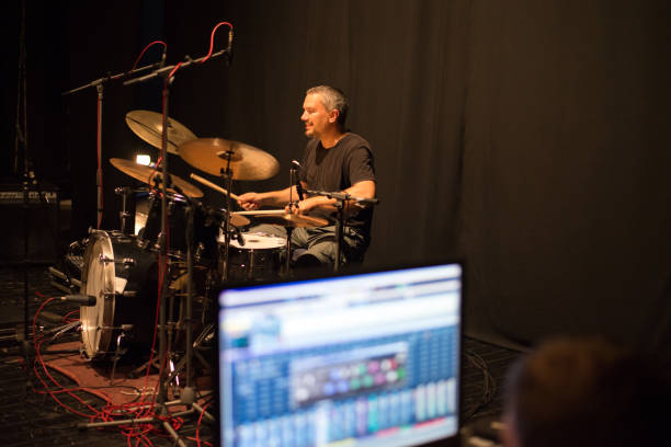 istock Drummer playing drums in the music recording studio 1201505278