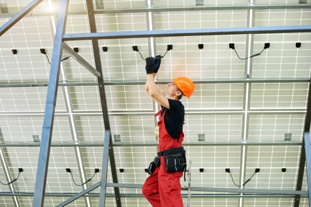 istock Expert is inspecting quality of a solar batterys. Ecology power conservation concept. 1201506607