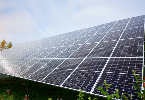istock Solar panels on sky background. Alternative sun energy concept. 1201507164