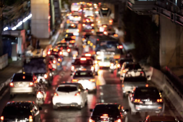 istock Defocused bokeh lights from traffic on expressway at night time. 1201508174