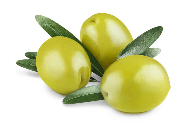 olives sur le blanc - olive verte photos et images de collection