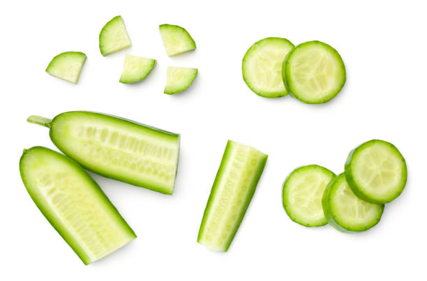 Mini Cucumbers Isolated On White Background Mini cucumbers isolated on white background. Flat lay, top view cucumber slice stock pictures, royalty-free photos & images