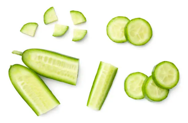 Mini cucumbers isolated on white background. Flat lay, top view