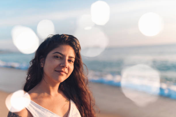 istock Happy woman on the beach 1201517187