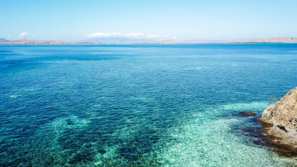 istock Komodo - A drone shor of a turquoise colored bay 1201517262