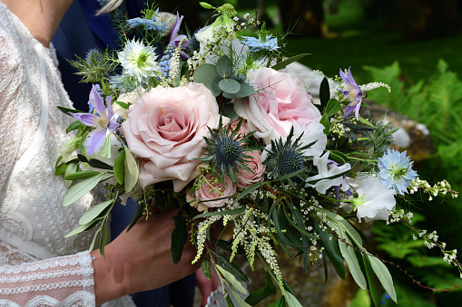 Close up of a brides bouquet of flowers at a wedding