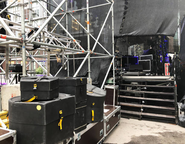 Backstage zone with flight cases, drum cases and other concert equipment.