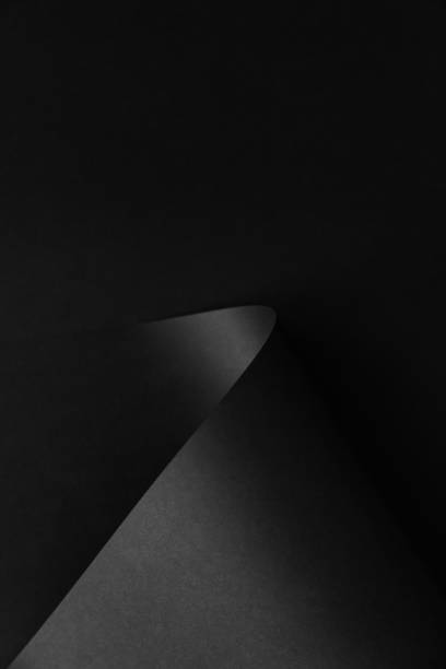 istock Black monochrome paper abstract background design 1201520987