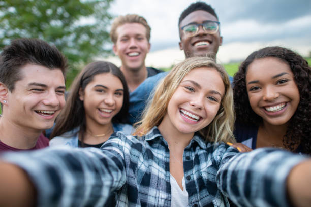 istock University Students Taking a Selfie stock photo 1201521331