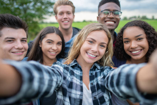 istock University Students Taking a Selfie stock photo 1201521332