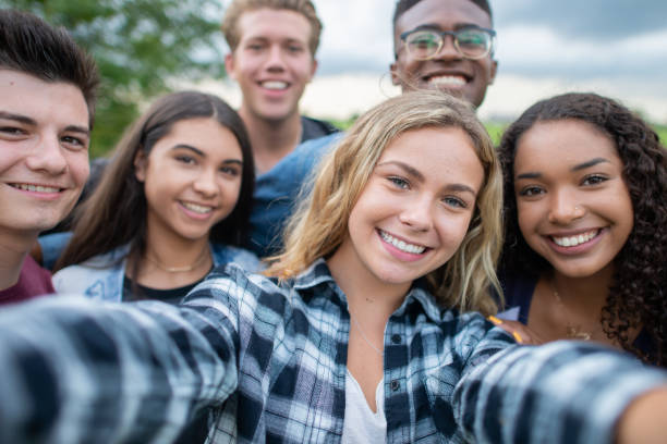 istock University Students Taking a Selfie stock photo 1201521337