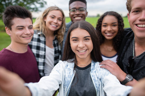 istock University Students Taking a Selfie stock photo 1201521381