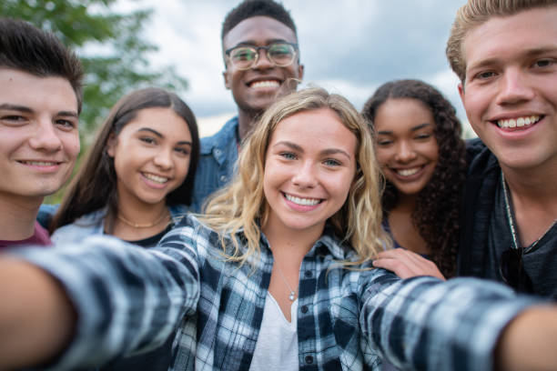 istock University Students Taking a Selfie stock photo 1201521383