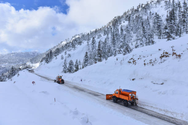 istock the moment when the main road opens with construction equipment and the magnificent mountain views on the roads 1201523910