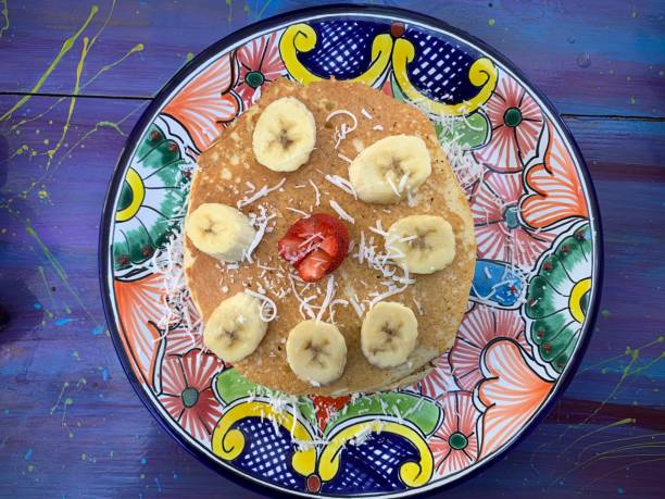 istock Pancakes with banana slices directly above view 1201525745