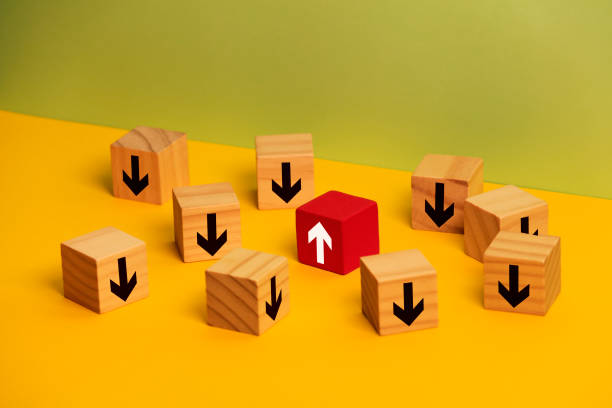 istock unique different arrow on wooden blocks toys, different leadership concept 1201525884
