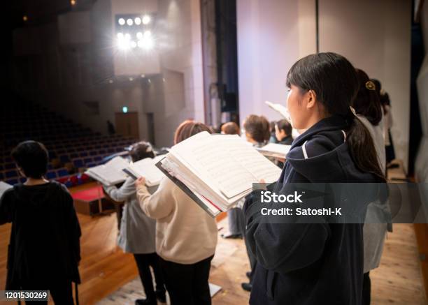 Rehearsal Of Womens Chorus Concert Stock Photo - Download Image Now - Choir, Singing, Stage - Performance Space