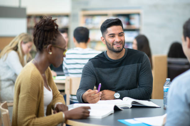 istock Post Secondary Students Studying stock photo 1201530729