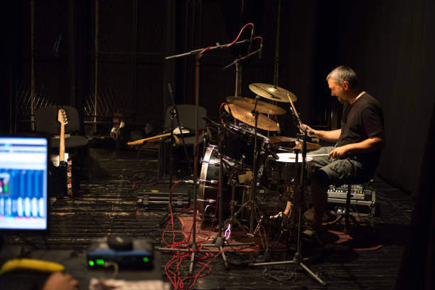 istock Drummer playing drums in the music recording studio 1201531590