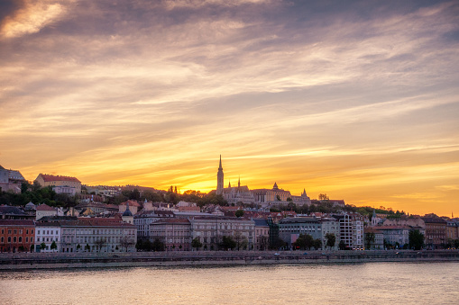 Pest district at sunset in front of danube river, Budapest, Hungary