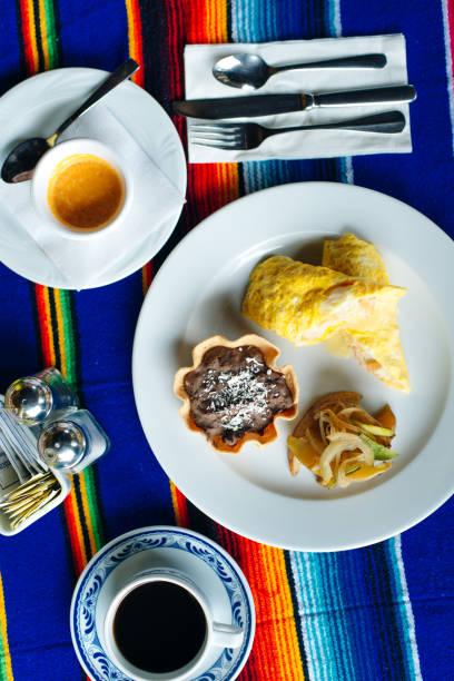 istock Two delicious indigenous mexican Rolls made with egg omelette with mole and onion 1201541993