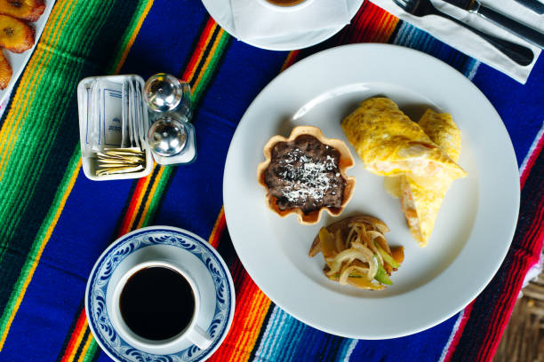 istock Two delicious indigenous mexican Rolls made with egg omelette with mole and onion 1201541999