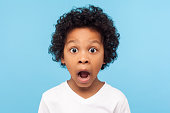 Wow, unbelievable! Portrait of funny amazed little boy looking at camera with shocked astonished expression