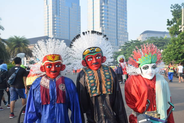 Ondel-ondel from Betawi Jakarta, Indonesia - January 19, 2020: Ondel-Ondel at car free day in Jakarta, Indonesia. Ondel-Ondel is one of traditional giant puppets from Betawi (native of Jakarta) ondel ondel betawi stock pictures, royalty-free photos & images