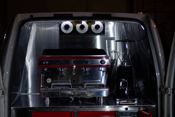 istock The coffee machine is integrated in the car. 1201553000
