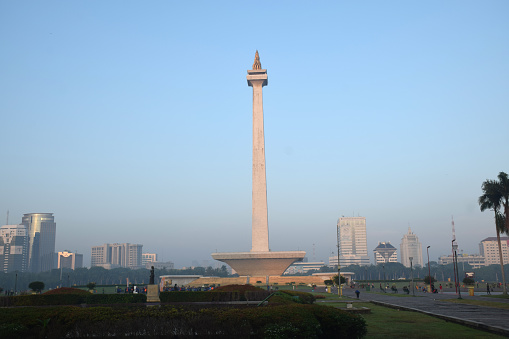 A sunny Sunday morning in the area of the National Monument (Monas) in Jakarta, Indonesia. This monument was built by Frederich Silaban and R. M. Soedarsono, began construction on August 17, 1961