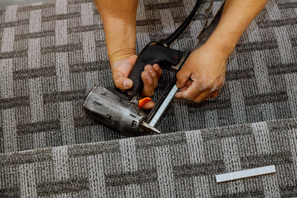 istock Installation of carpet laying stairs flooring 1201564890