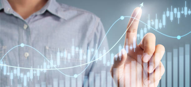 istock Businessman plan graph growth increase of chart positive indicators in his business 1201564937