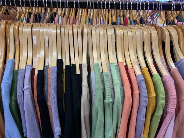 istock Colorful of clothes hangers 1201567591