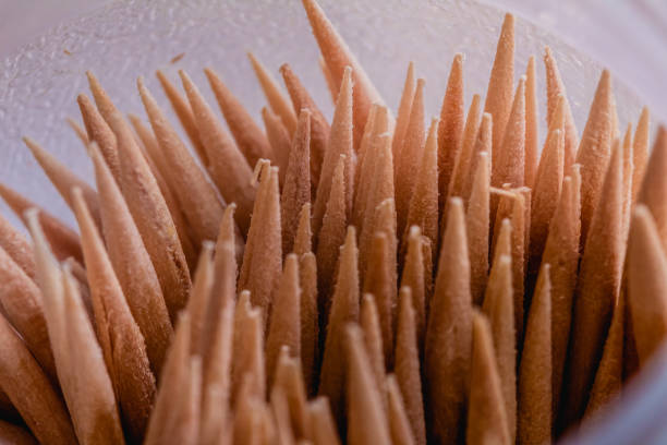 Toothpick ( palito de dente ). Macro photograph of toothpicks in a plastic container.