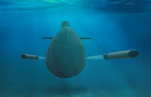 Naval military submarine firing torpedoes underwater