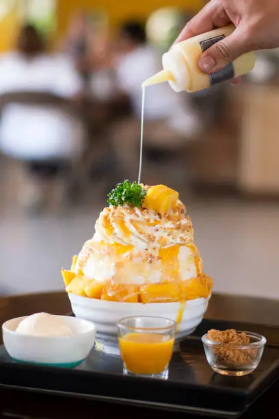 Photo of Bingsu mango with ice cream Korean dessert