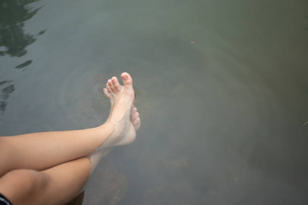 istock Feet in the Hot springs from Thailand. 1201576442