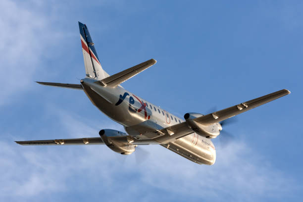 rex (regional express airlines) saab 340 aereo pendolare regionale bimotore decollato dall'aeroporto di adelaide. - saab casa automobilistica foto e immagini stock