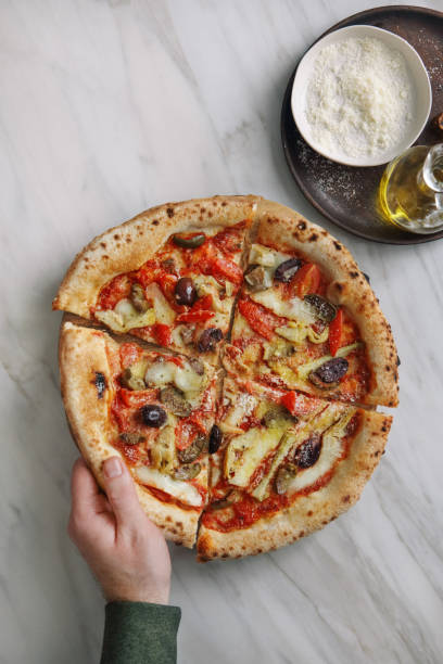 istock Homemade Artichoke and Olive Pizza 1201588217