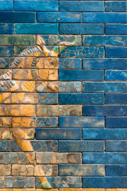 detailed wall fragment with Aurochs symbol of Hadad deity from ancient Babylon"r"n