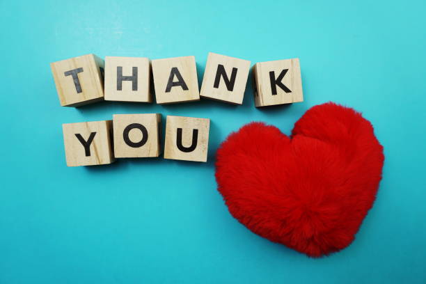 istock Thank You alphabet letters  with space copy on blue background 1201599961