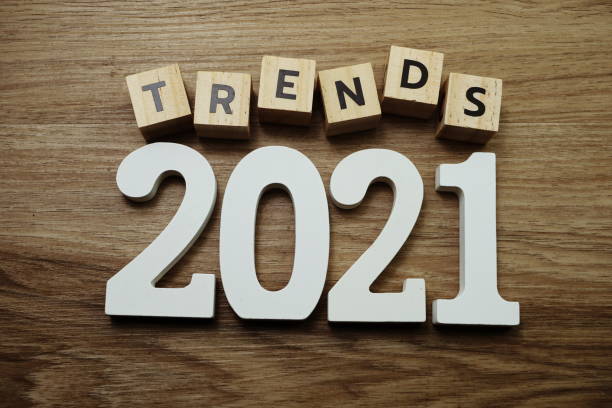 istock Trends 2021 word alphabet letters on wooden background 1201600593