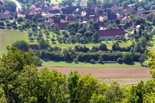 aerial view of a village named Baechlingen in Hohenlohe, Germany at late summer time
