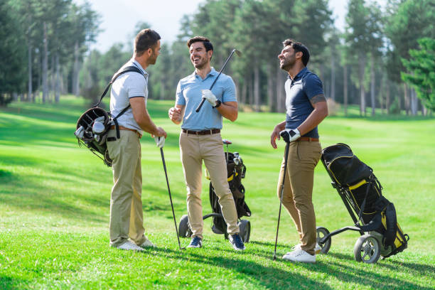 istock Friends Playing Golf on a Beautiful Sunny Day 1201604300