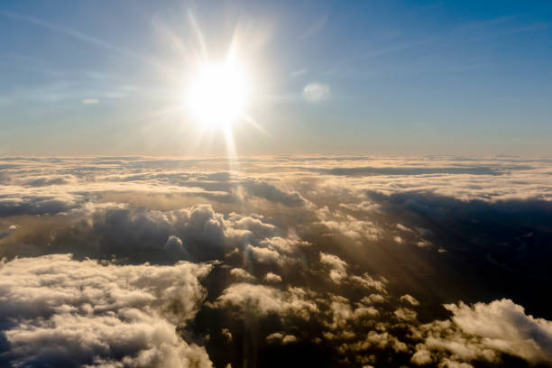 istock Flying above the clouds, view from the airplane 1201604414