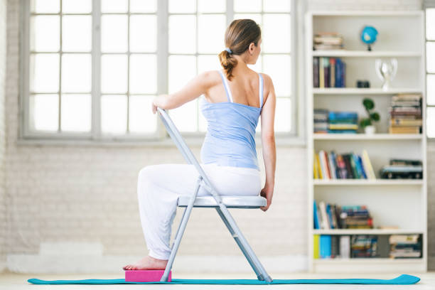 istock Pregnant woman practicing yoga at home 1201604648