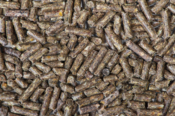 istock Pile of dry grass pellets 1201606446