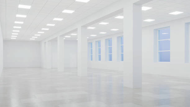 istock Interior of an empty commercial building with white walls. Office space. Night. Evening lighting. 3D rendering. 1201607186